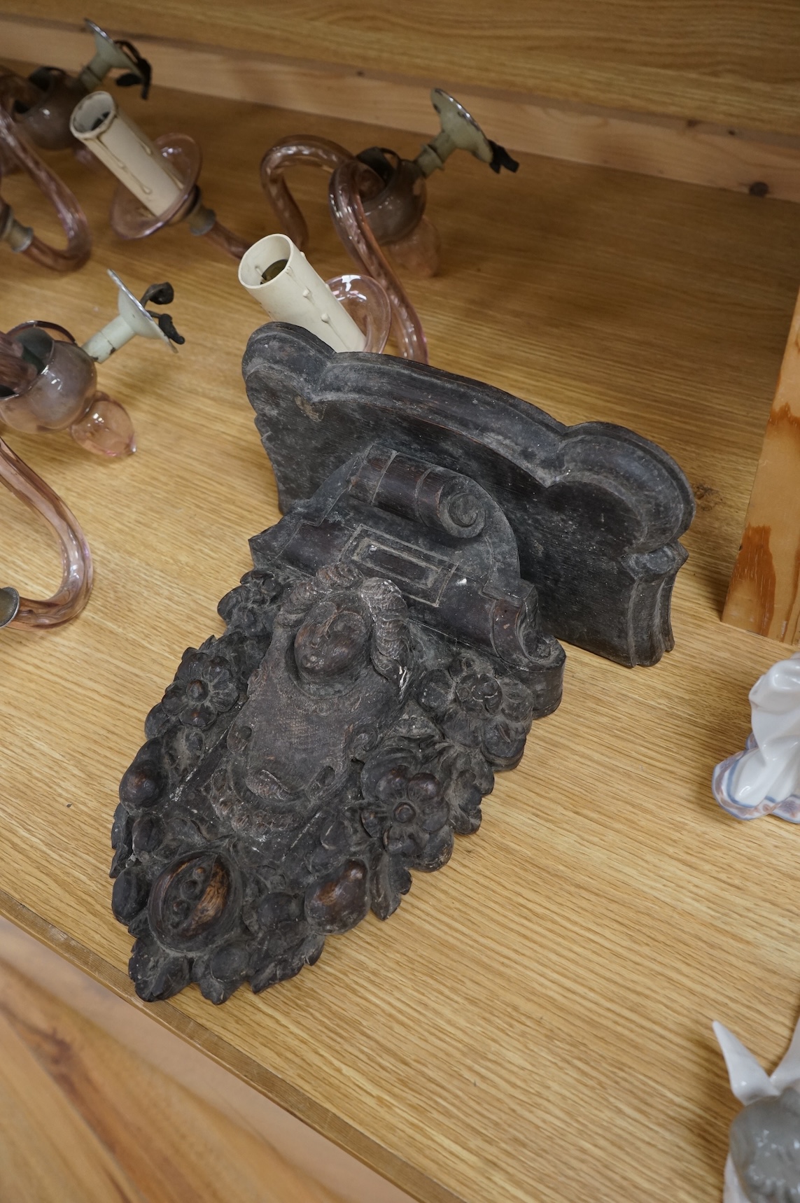 A Carved oak figural wall bracket, in late 17th century style, 35cm long